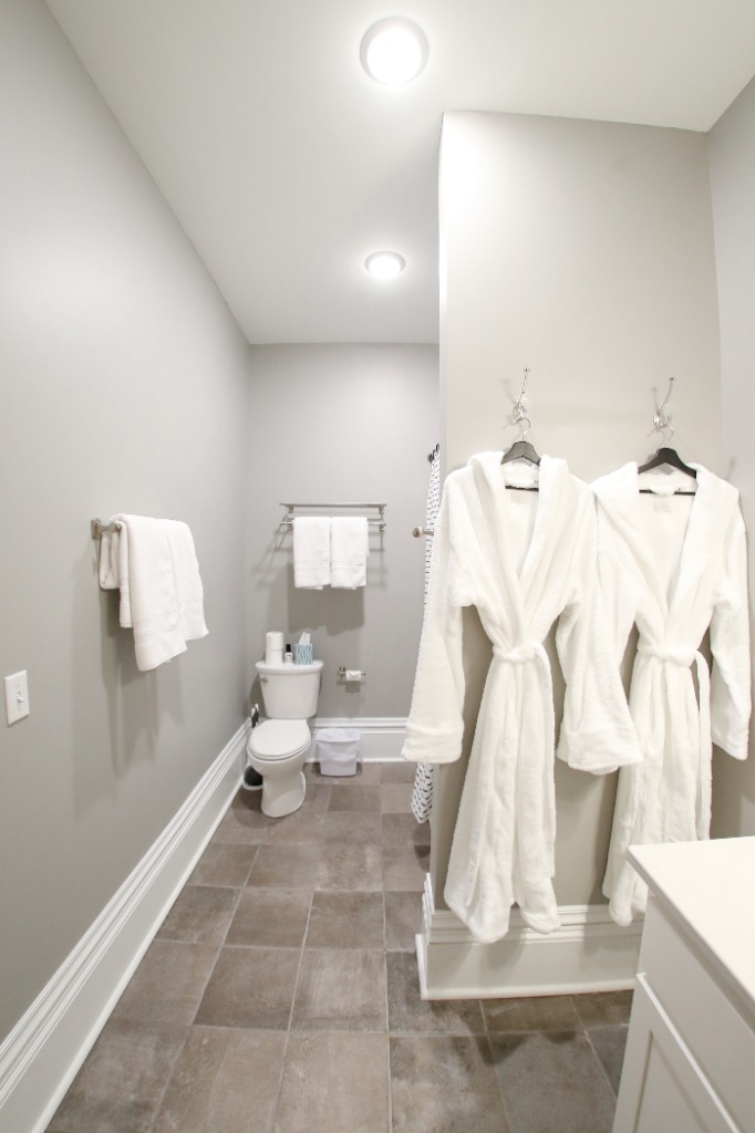 Bathroom with plush robes and fresh towels